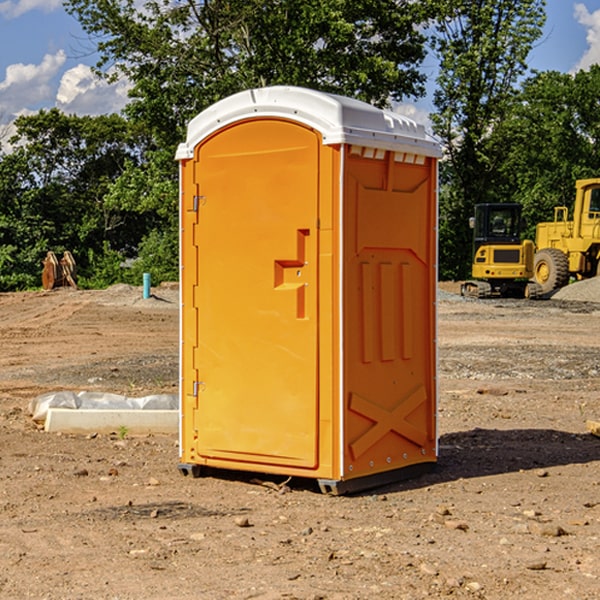 how often are the portable restrooms cleaned and serviced during a rental period in Harding County NM